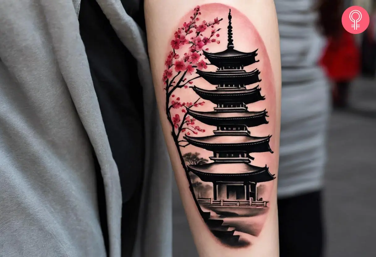 Aesthetic pagoda forearm tattoo on a woman