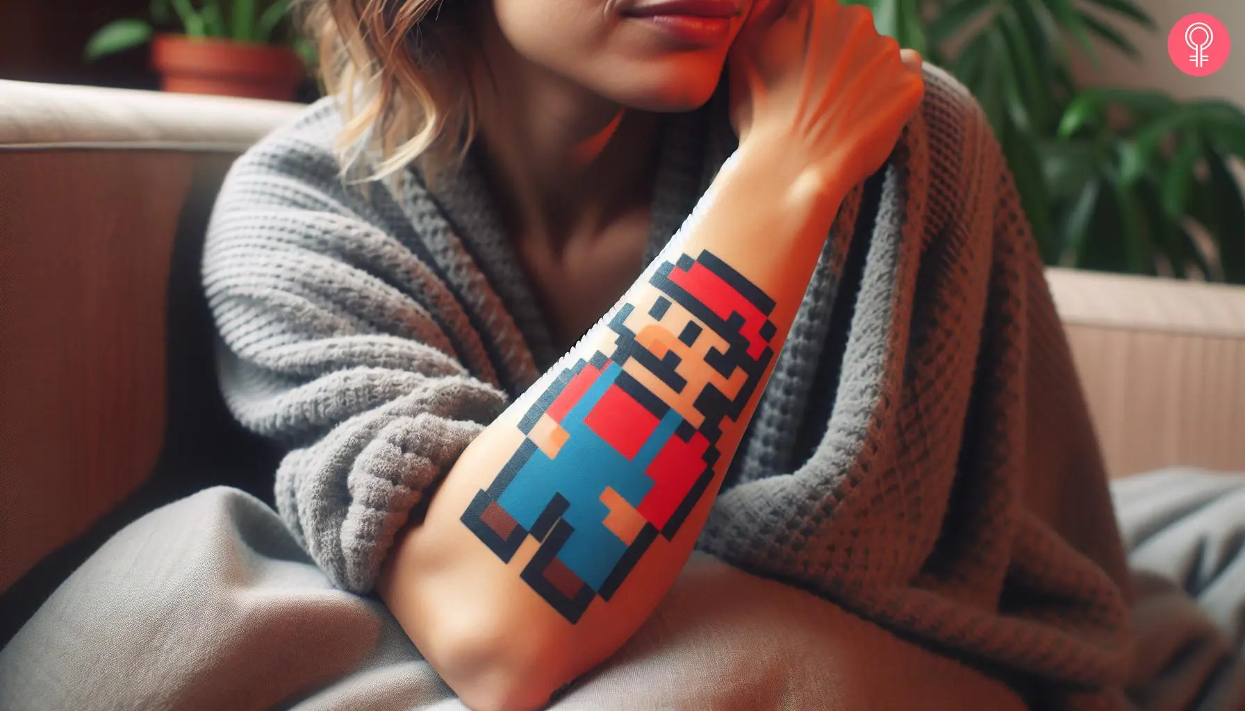 Mario pixel tattoo on a woman’s forearm