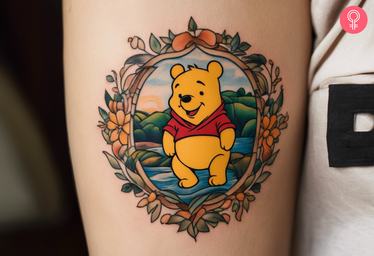 Pooh Bear tattoo on the upper arm