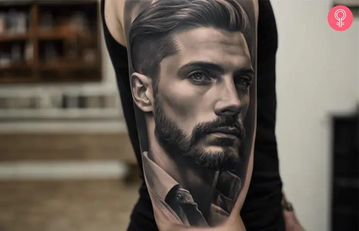 A man wearing a portrait half-sleeve tattoo