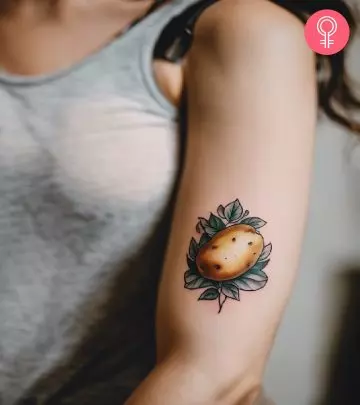 Peanut tattoo on the upper arm