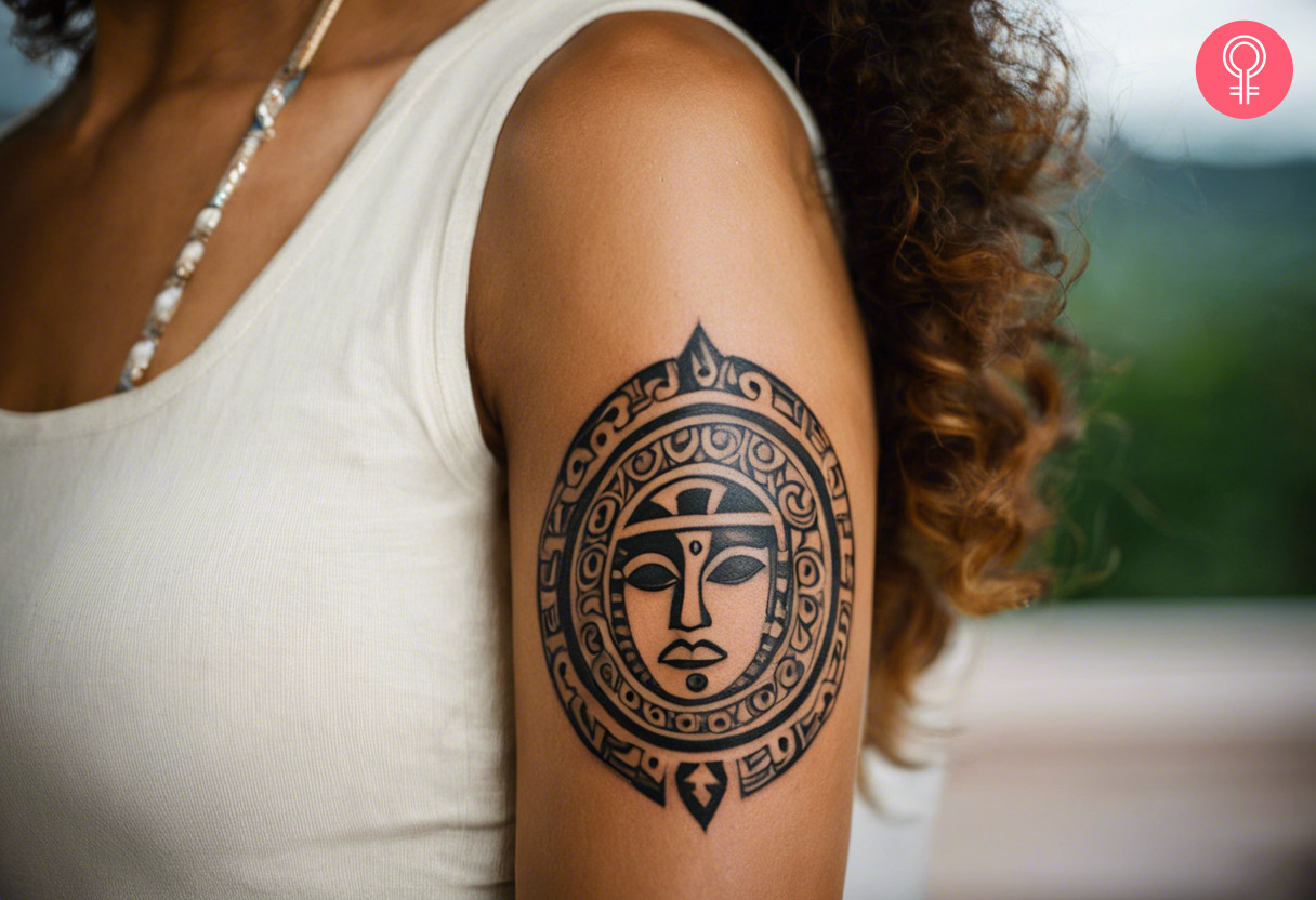 Puerto rican taino tattoo on the arm of a woman