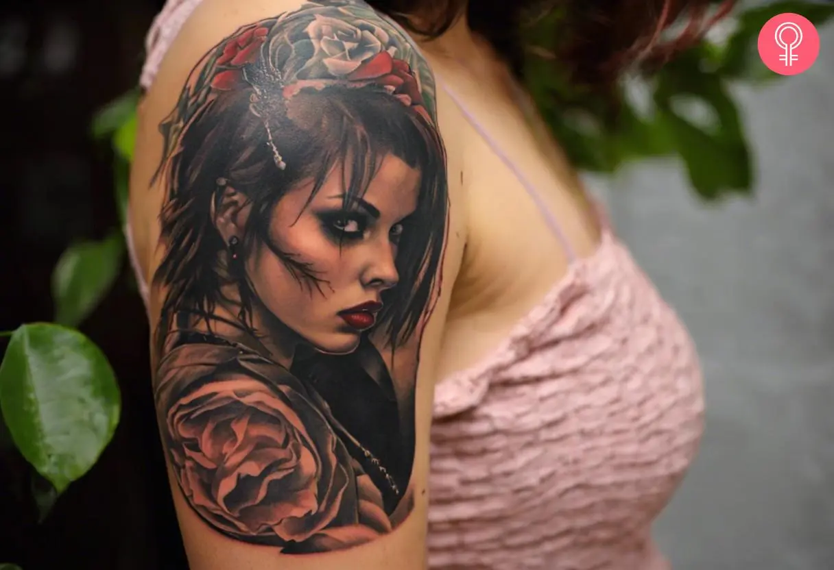 Punk girl tattoo on a woman’s upper arm