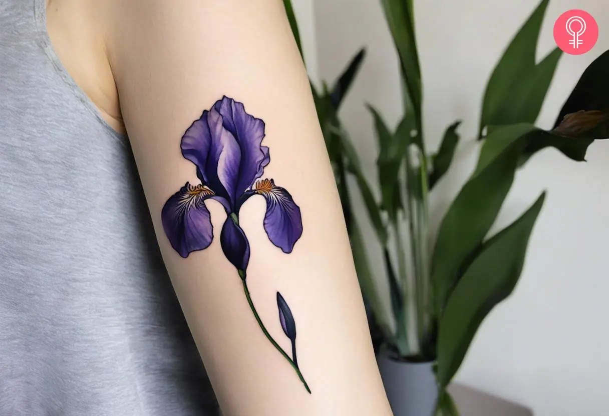 Purple iris tattoo on the upper arm