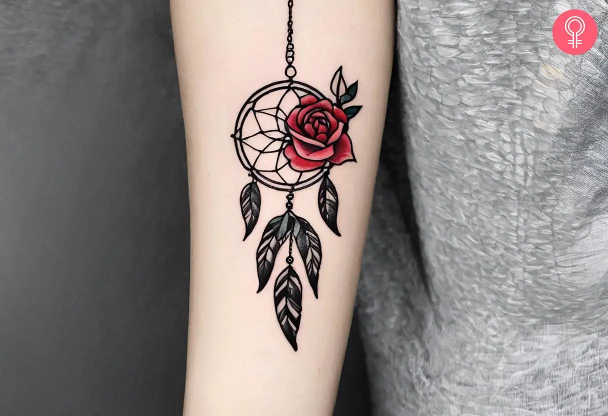 Rose dreamcatcher tattoo on the forearm