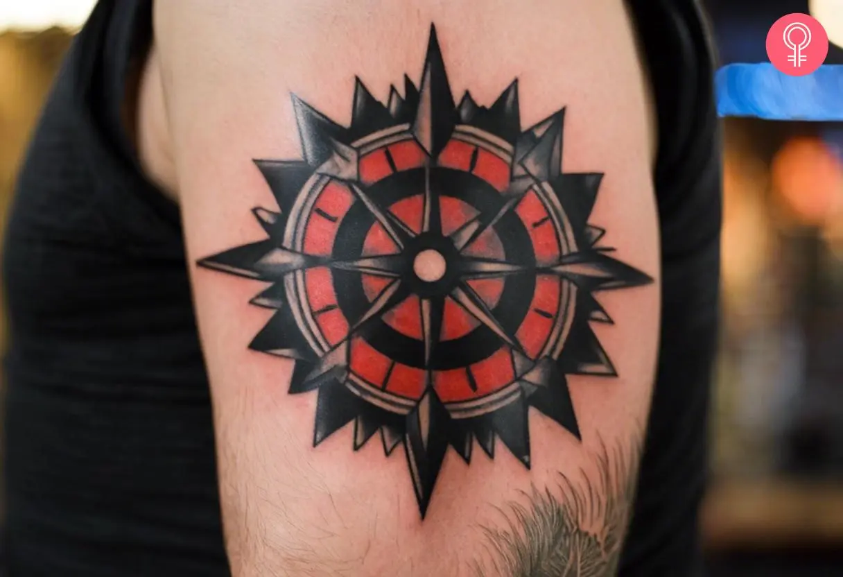 Saw blade tattoo on the upper arm of a man