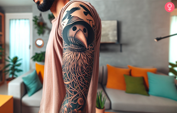 An upper arm tattoo showcasing a scarecrow's head