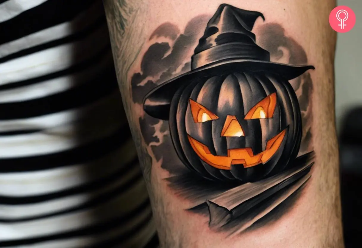 A scary jack-o'-lantern tattoo on the forearm