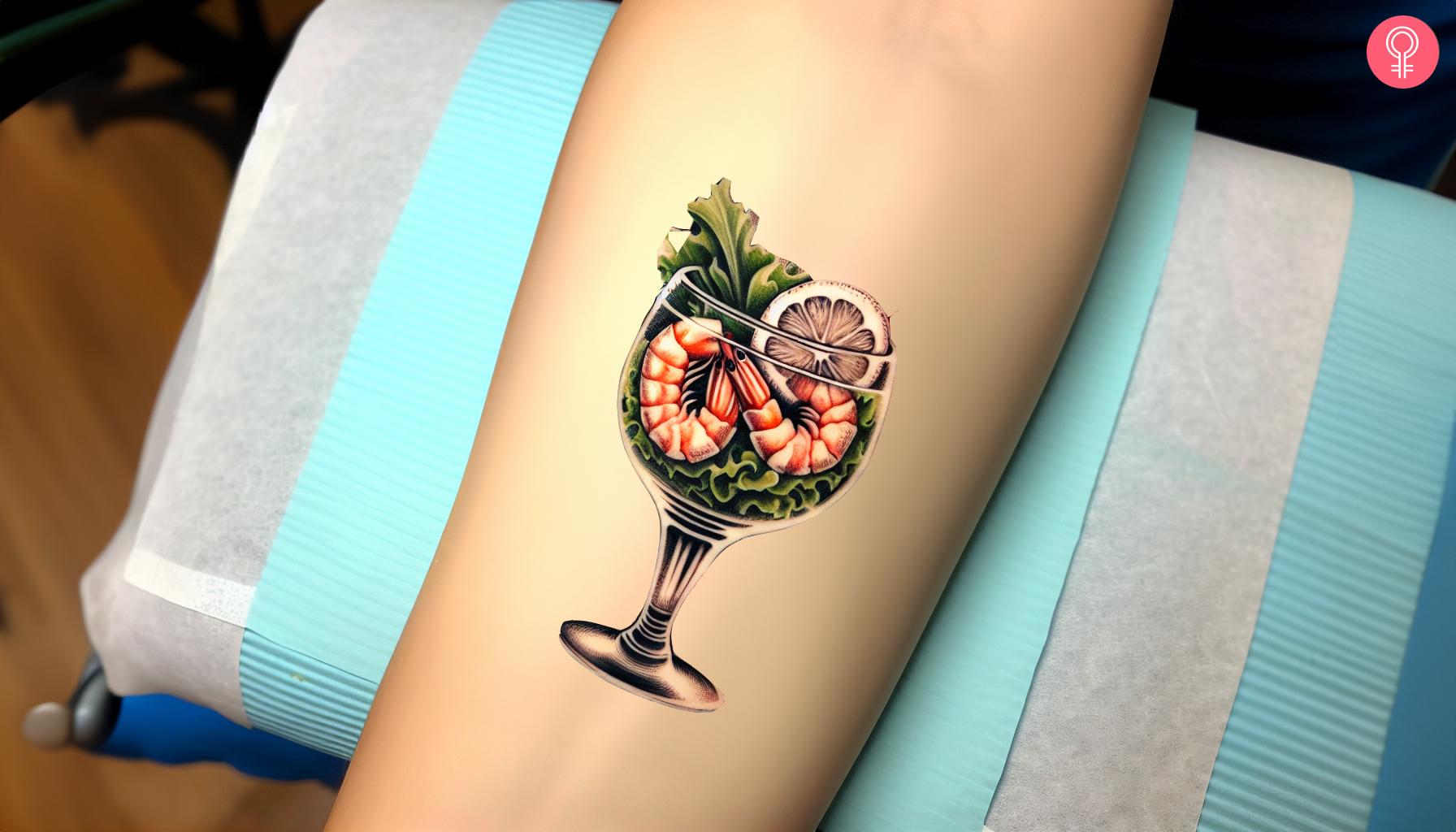 Shrimp cocktail tattoo on forearm