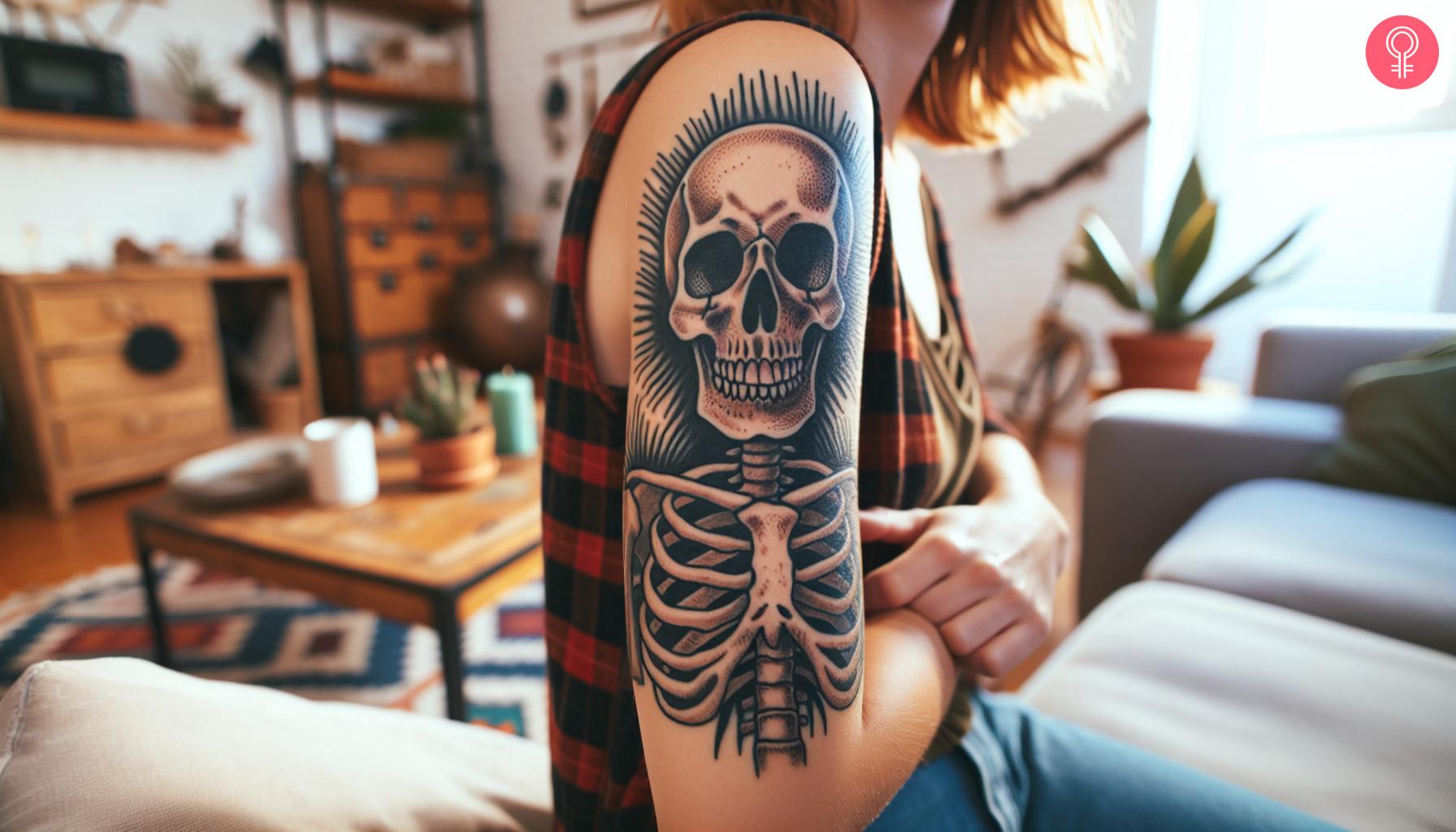 Skeleton tattoo on upper arm