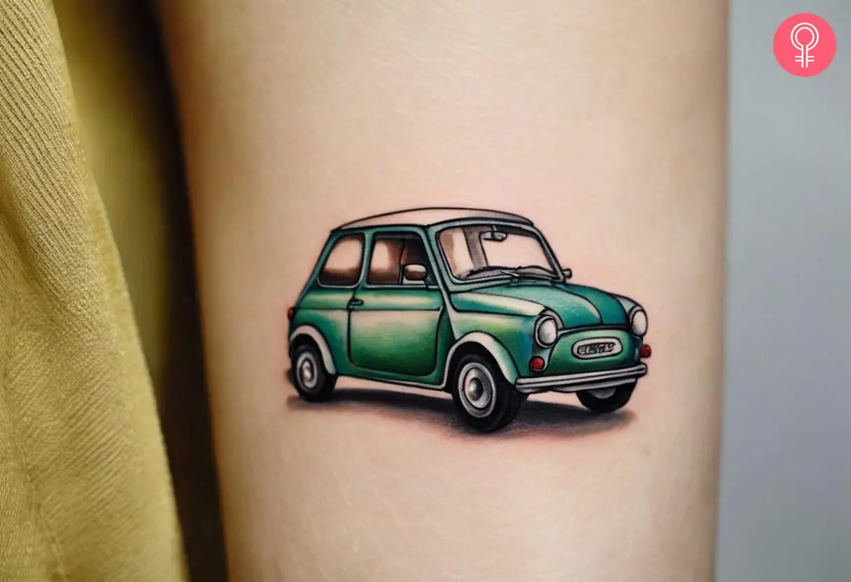 Small car tattoo on the upper arm