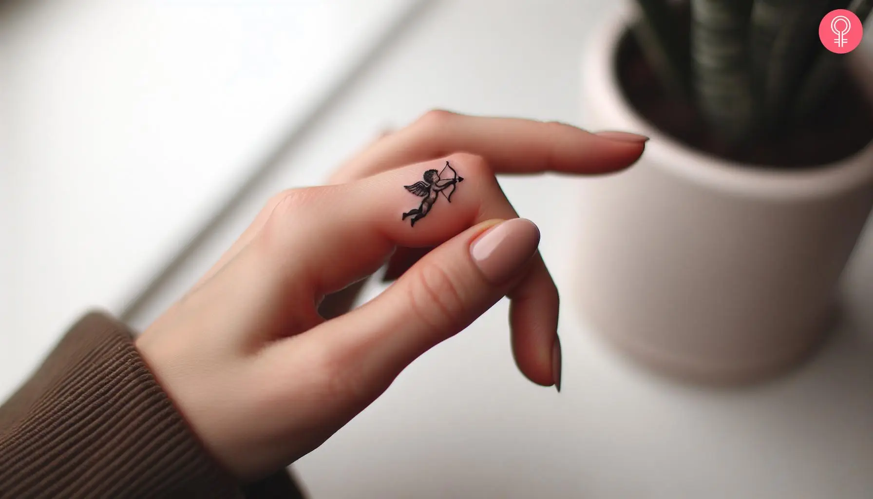 Small Cupid Tattoo