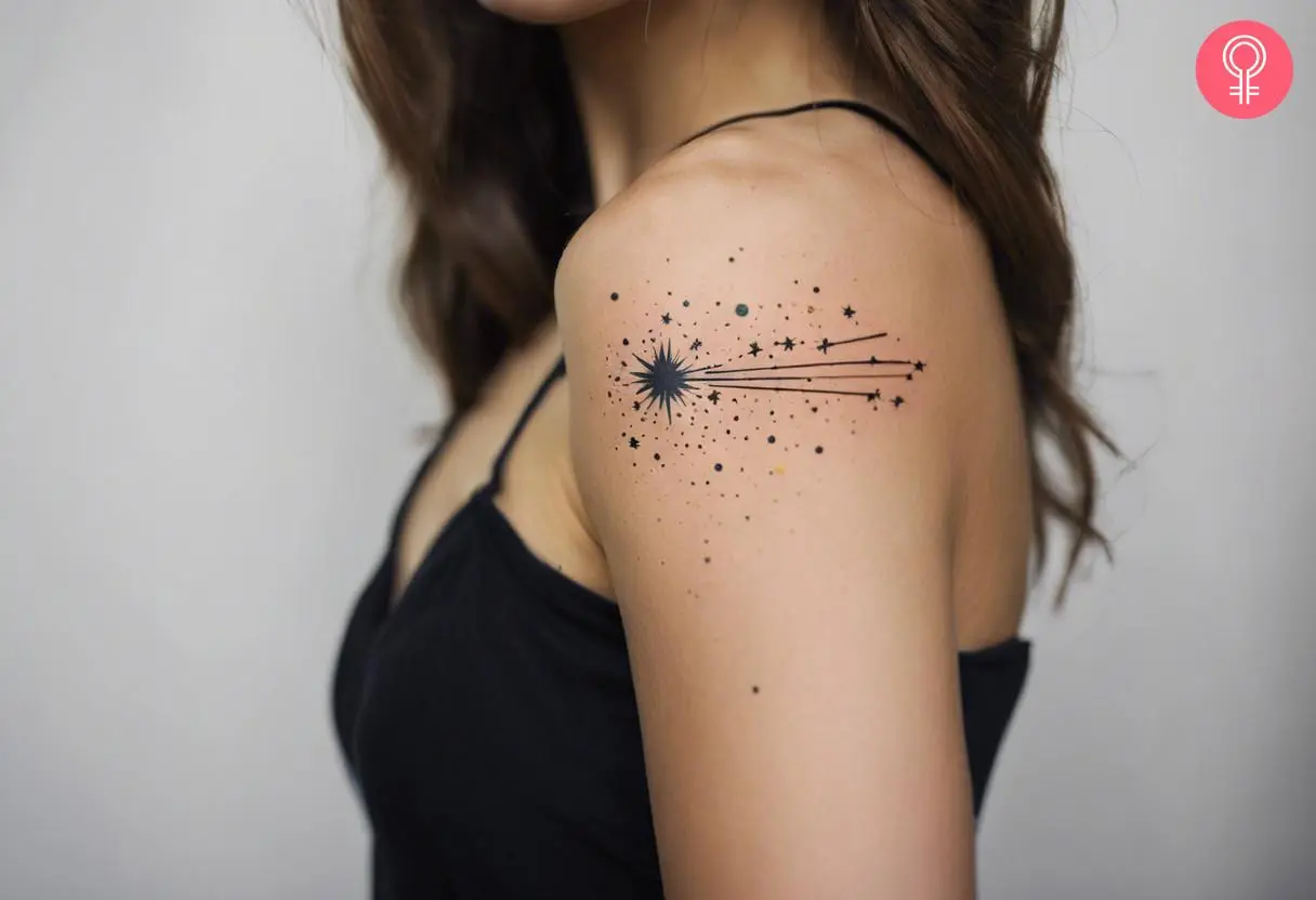 Small celestial tattoo on her upper arm