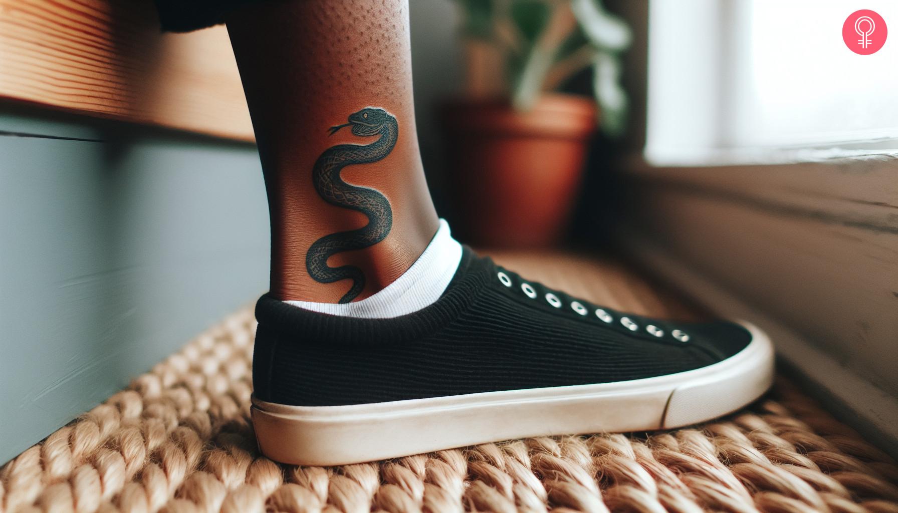 Snake tattoo on a man's ankle