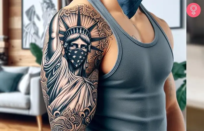 Statue of liberty with a bandana tattoo on the upper arm