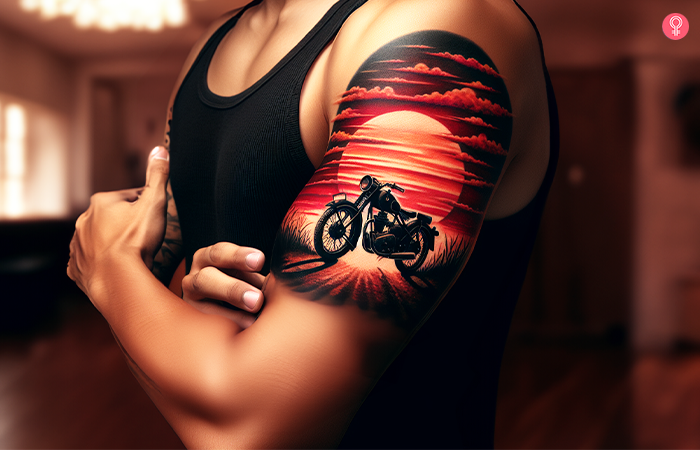 Sunset tattoo on the upper arm of the man