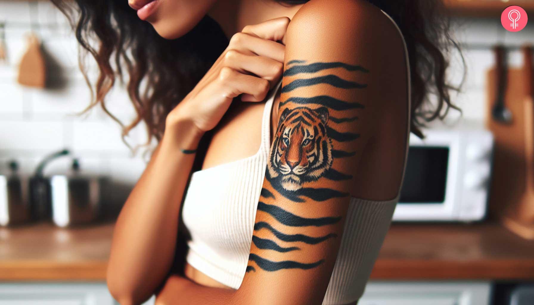 Tiger stripe camo tattoo on the upper arm