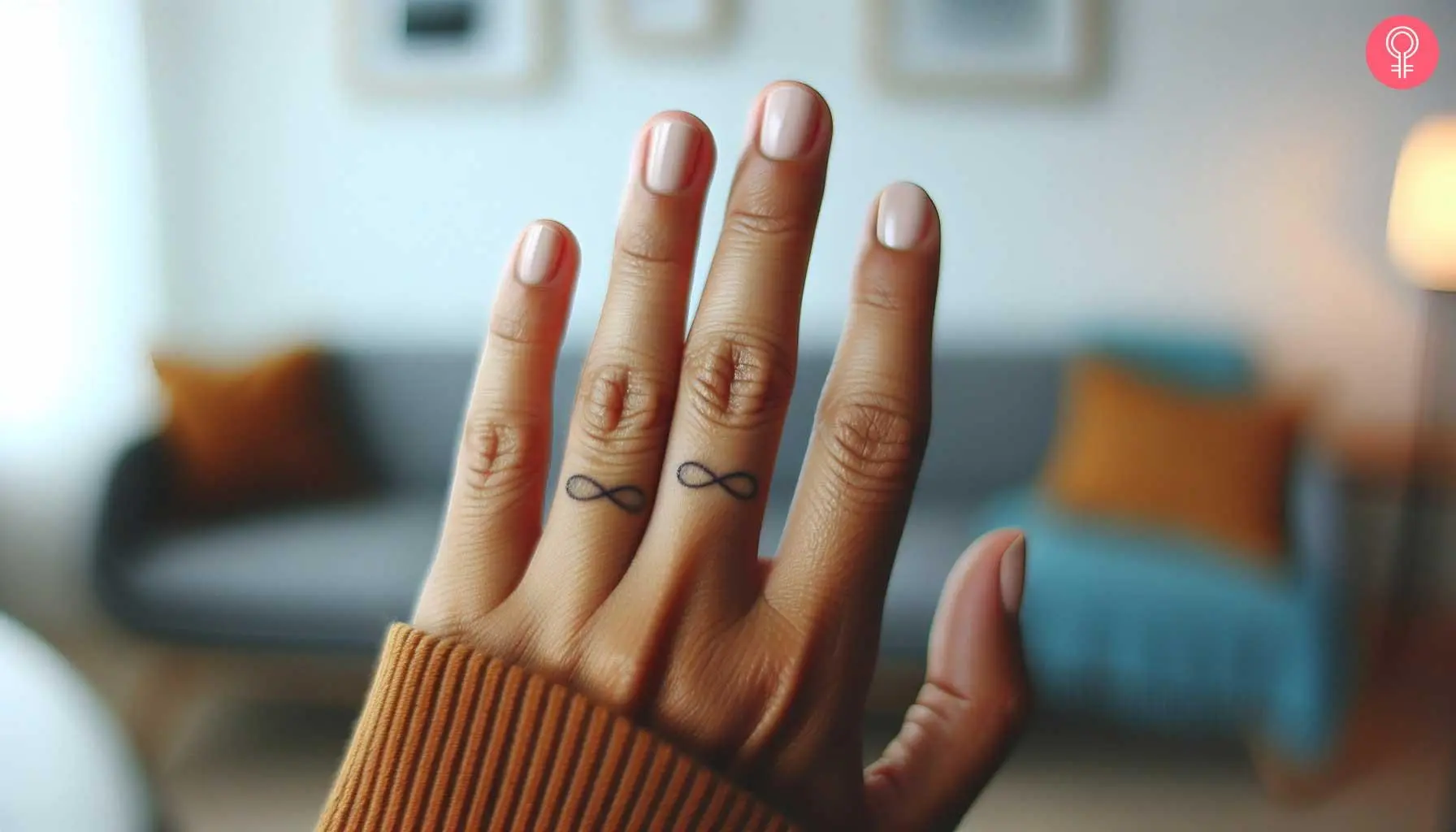 Tiny double infinity tattoos on the fingers