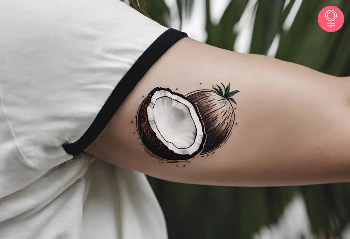 A traditional coconut tattoo on a woman’s bicep