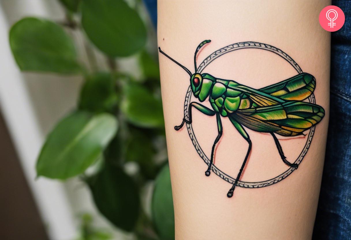 A traditional grasshopper tattoo on a woman's arm