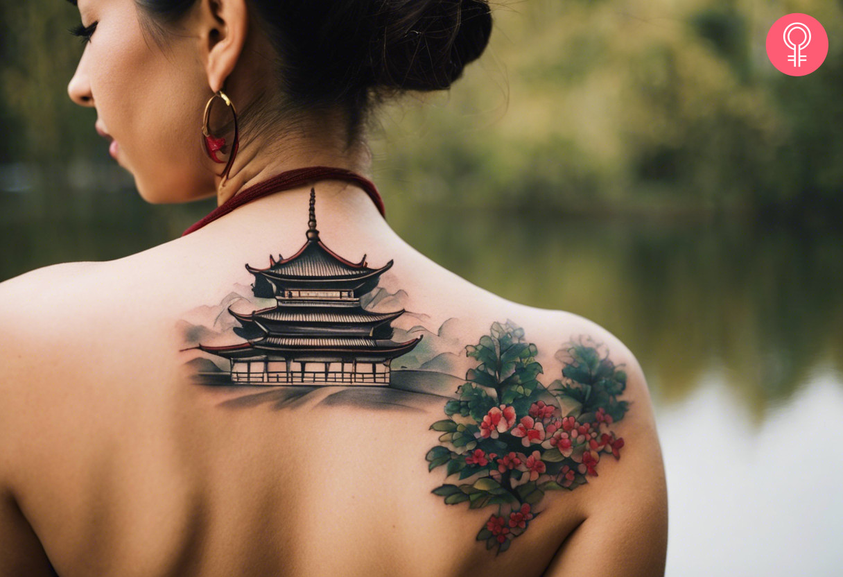 Traditional pagoda tattoo on the upper back of a woman