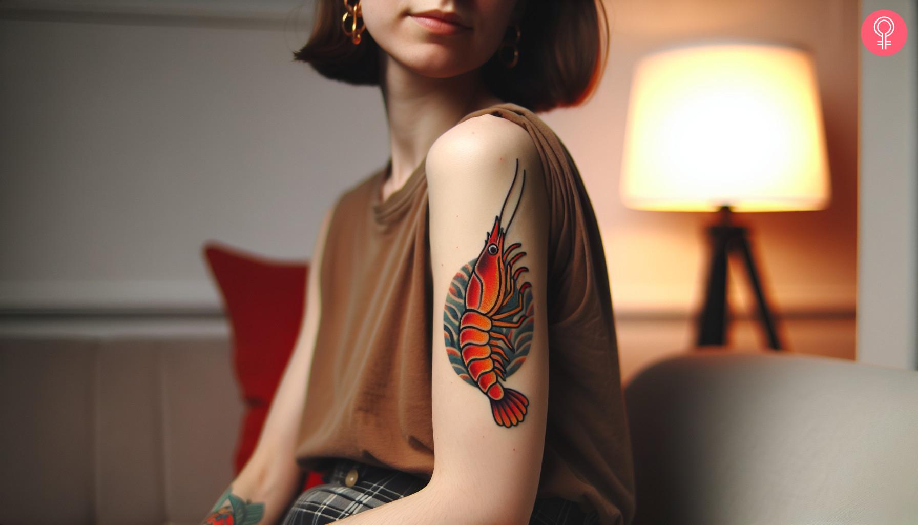 Traditional shrimp tattoo on a woman's upper arm