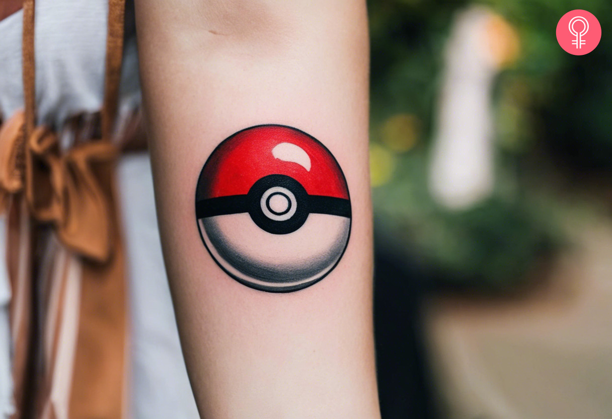 Traditional pokeball tattoo on a woman’s forearm