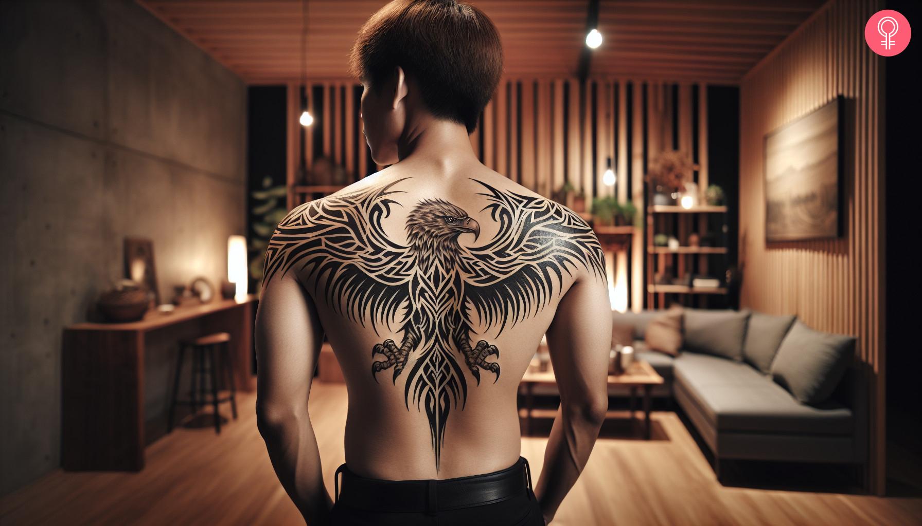 Tribal eagle tattoo on the back