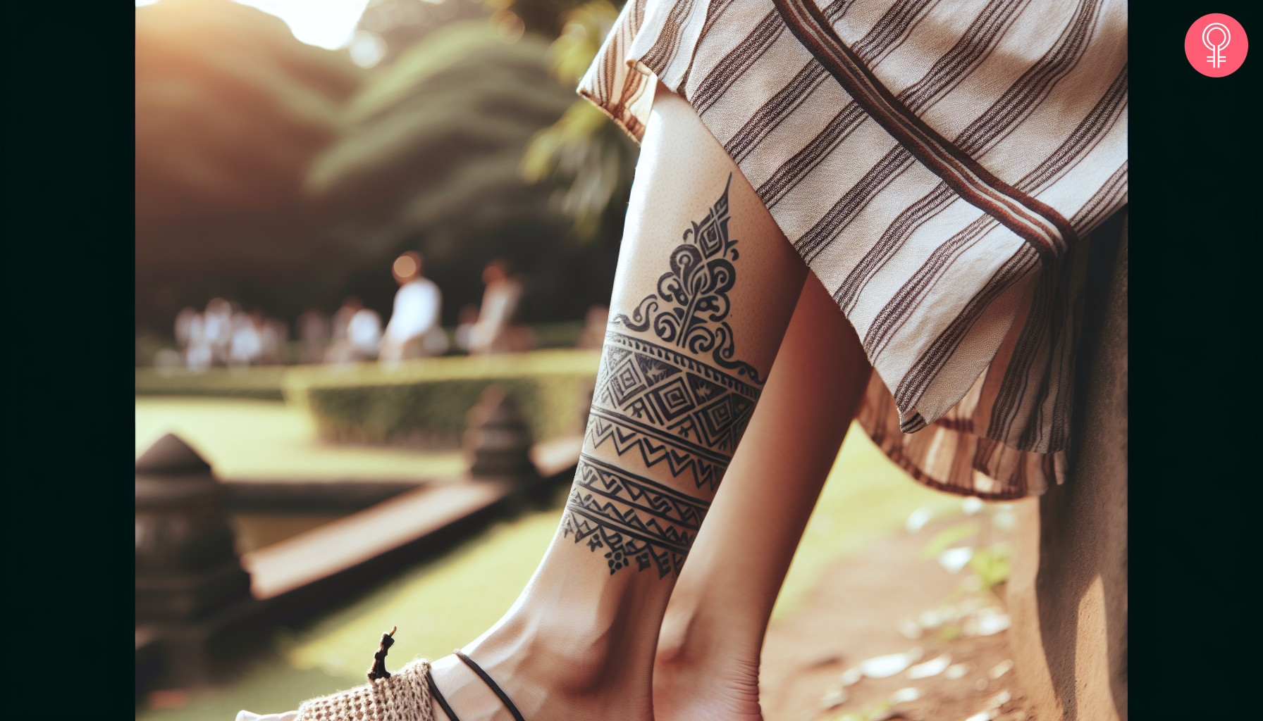 Woman with a tribal leg band tattoo