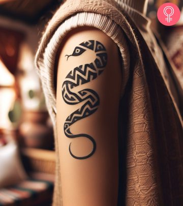 Sport a striking tribal serpent tattoo on your skin to honor primal energy and raw force.