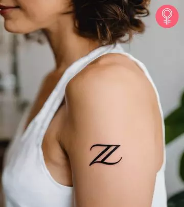 Z tattoo on the upper arm