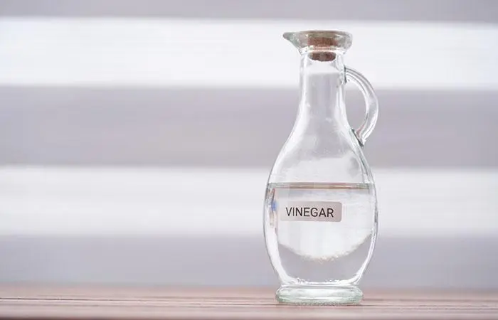 Close-up shot of white vinegar on a table