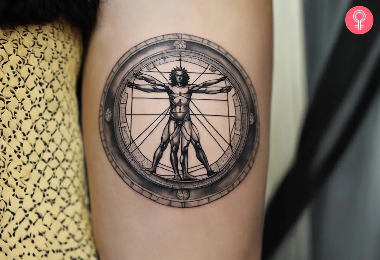 Vitruvian man tattoo on the forearm of a woman