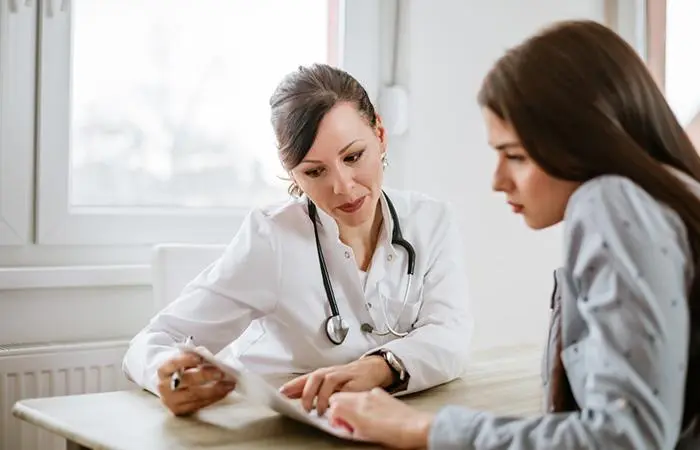 Woman consulting a dermatologist