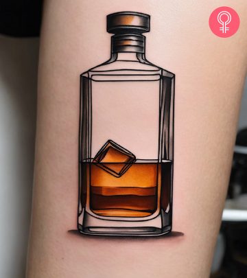 A woman with a beer tattoo on her arm