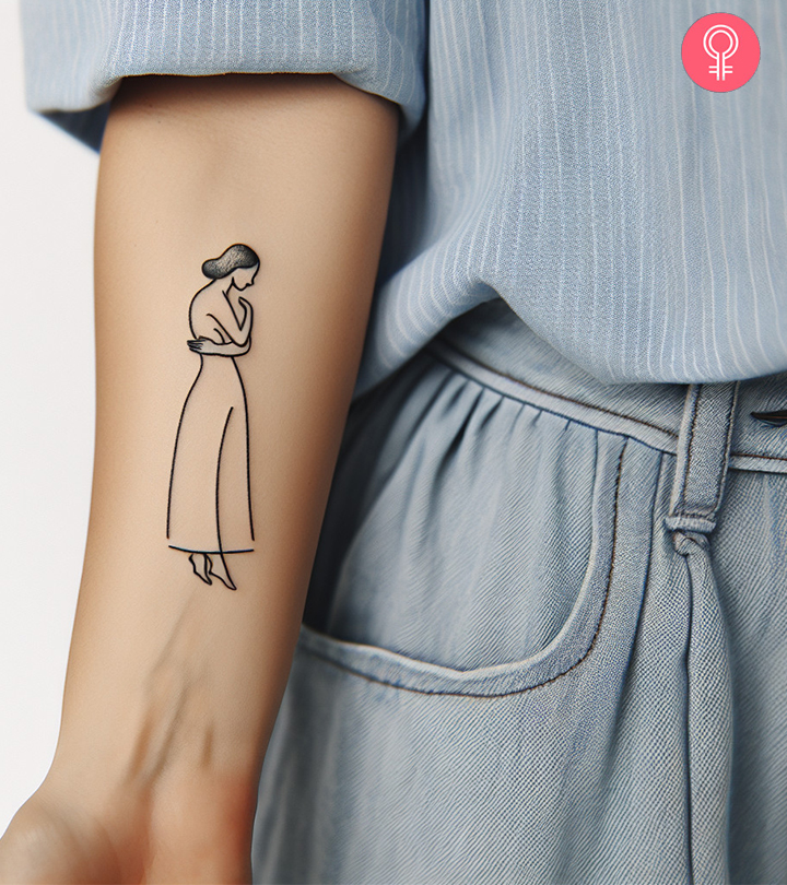 Woman flaunting a self-love tattoo on her forearm