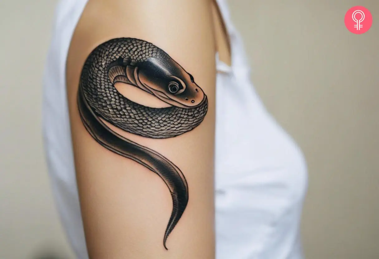 Woman with Japanese eel tattoo on her arm