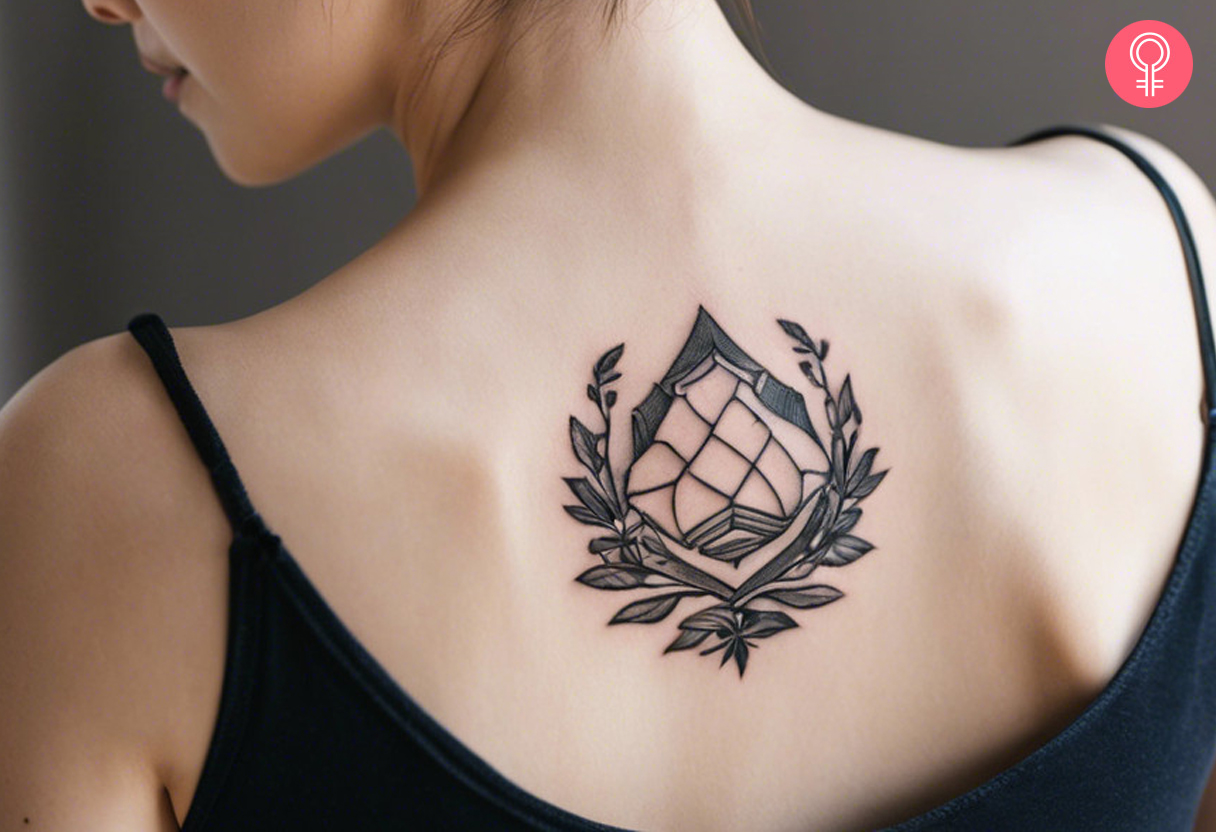 Woman with Japanese family crest tattoo on her upper back