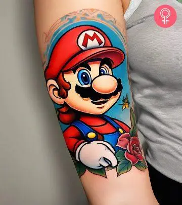 A man with a mario video game tattoo on his forearm