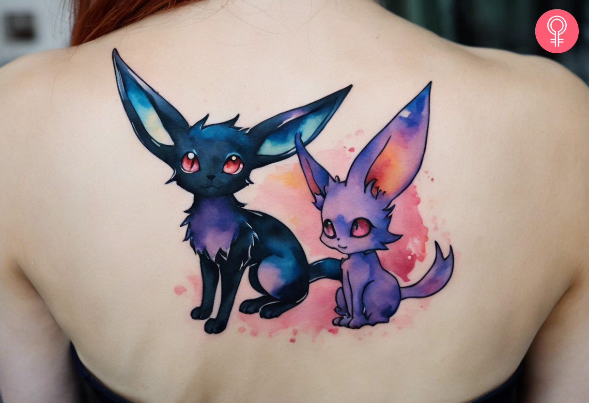 Woman with Umbreon and Espeon tattoo on her upper back