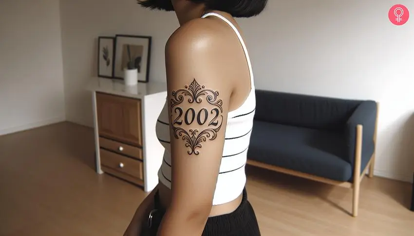 Woman with a 2002 birth year tattoo