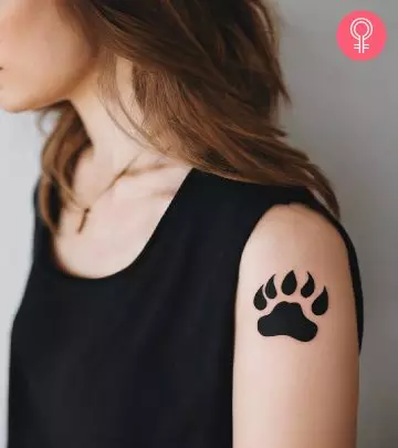 Bear tattoo on a woman’s upper arm