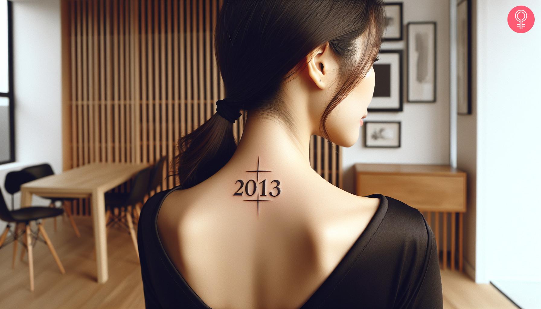 Woman with birth year tattoo on neck