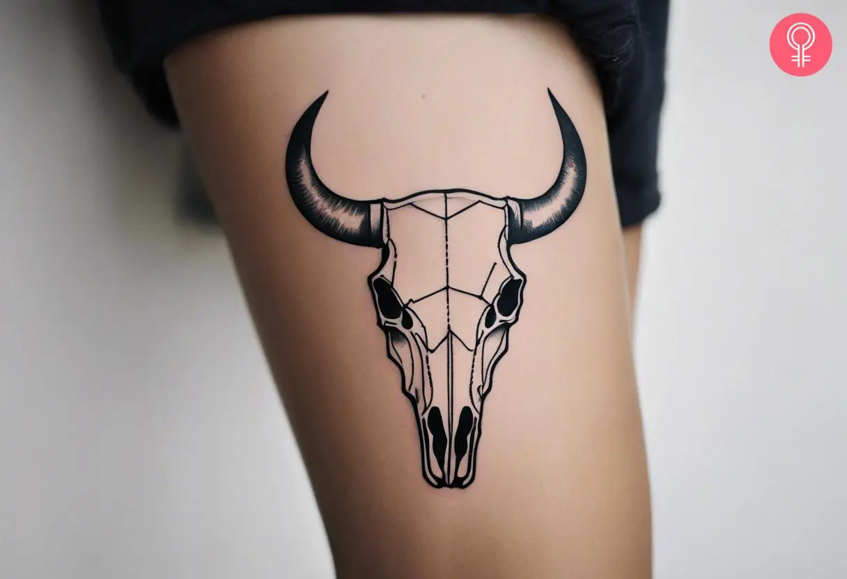 Woman with a minimalist bull skull tattoo