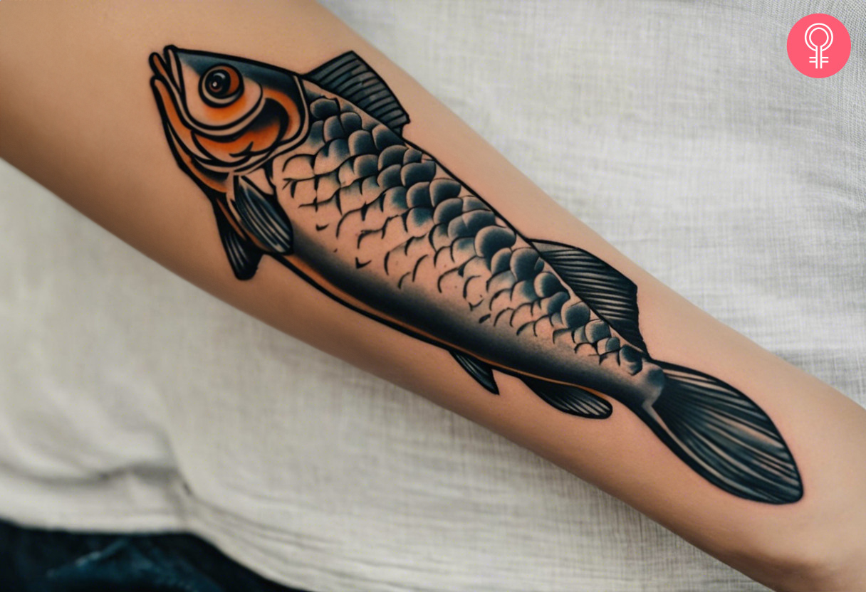 Woman with a traditional catfish tattoo on her forearm
