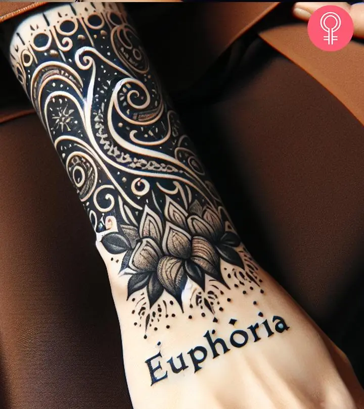 Woman with an euphoria tattoo on the forearm