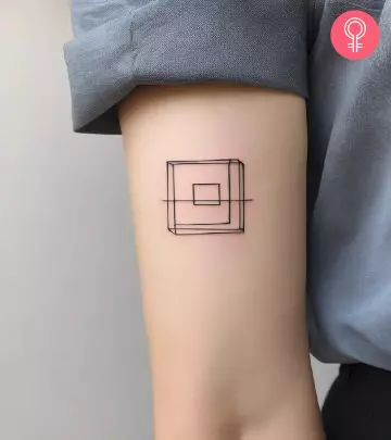 A maze tattoo on the arm of a woman