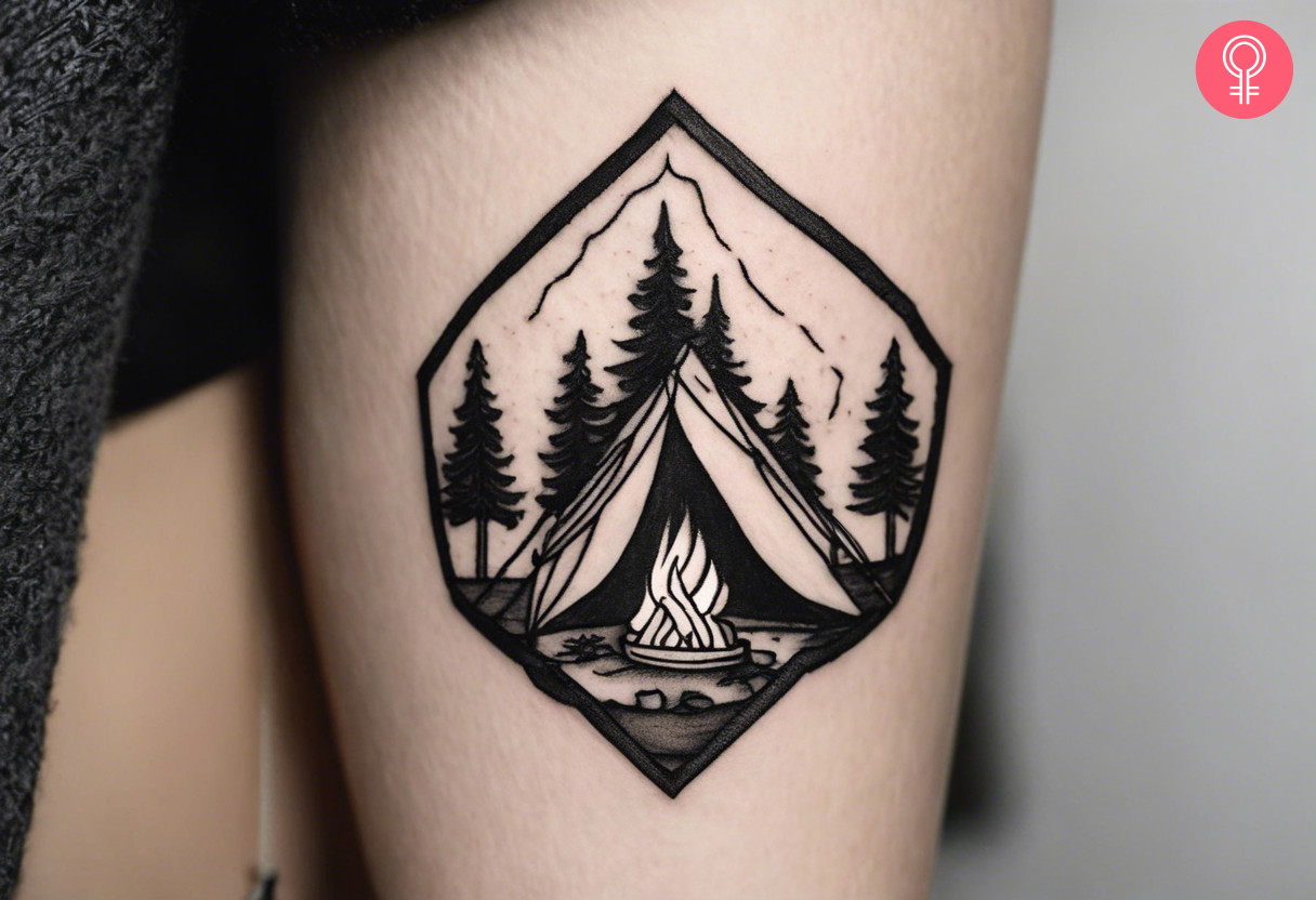 Woman with black and white campfire tattoo on her thighs