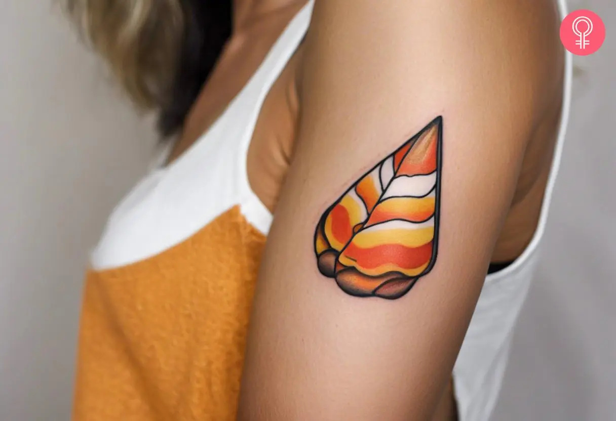 Woman with candy corn tattoo on her arm