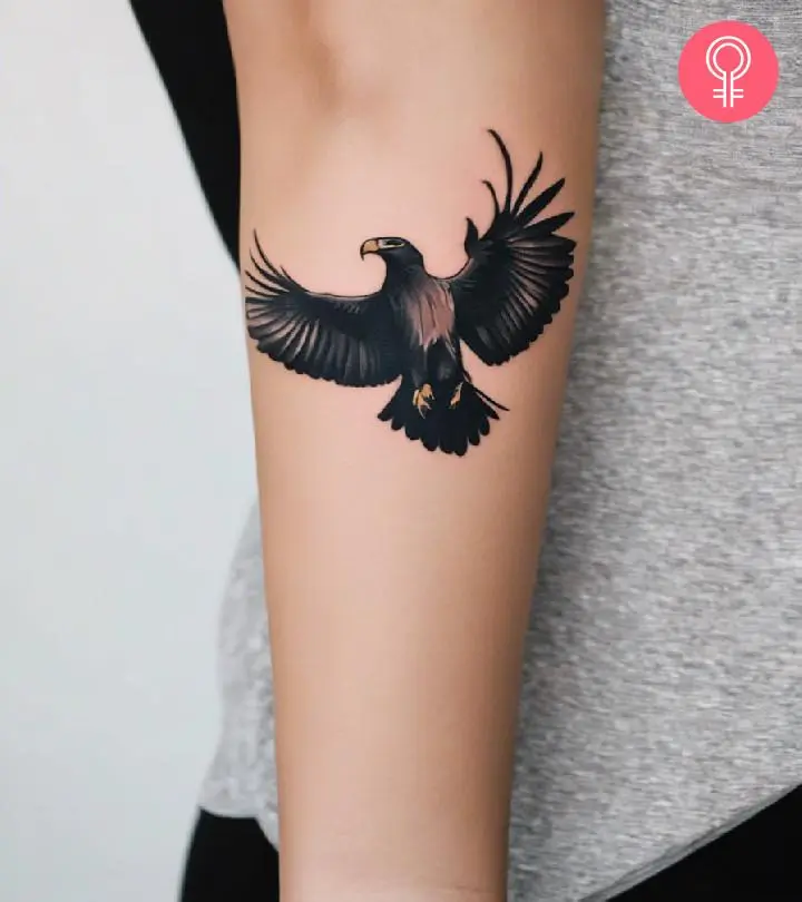 Woman with condor tattoo on her arm